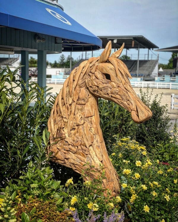 Teakwood ground-mounted horse head sculpture