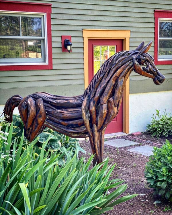 Teakwood standing horse sculpture